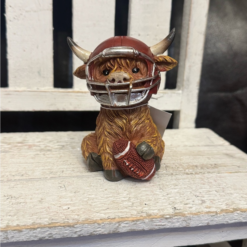 Cute highland cow with Football Figurine